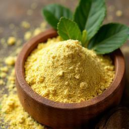 Lemon Myrtle Powder in wooden bowl with fresh leaves